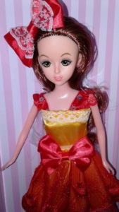 красивая кукла в красно-желтом платье из серии Rose Girl 